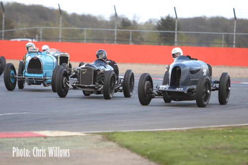 Three abreast in a corner rarely works  Tom Walker in the 118 litre Hispano-engined Amilcar used power and adept cornering to seal the victory